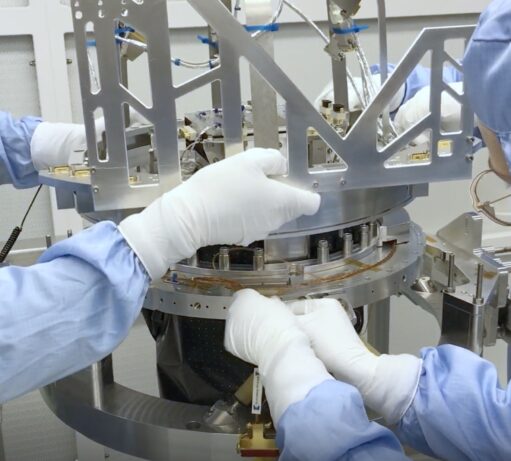 People working in SRONS cleanroom on a space camera. This is to illustrate the kind of cleanroom a candidate technical employee will work on, when applying for this vacancy.